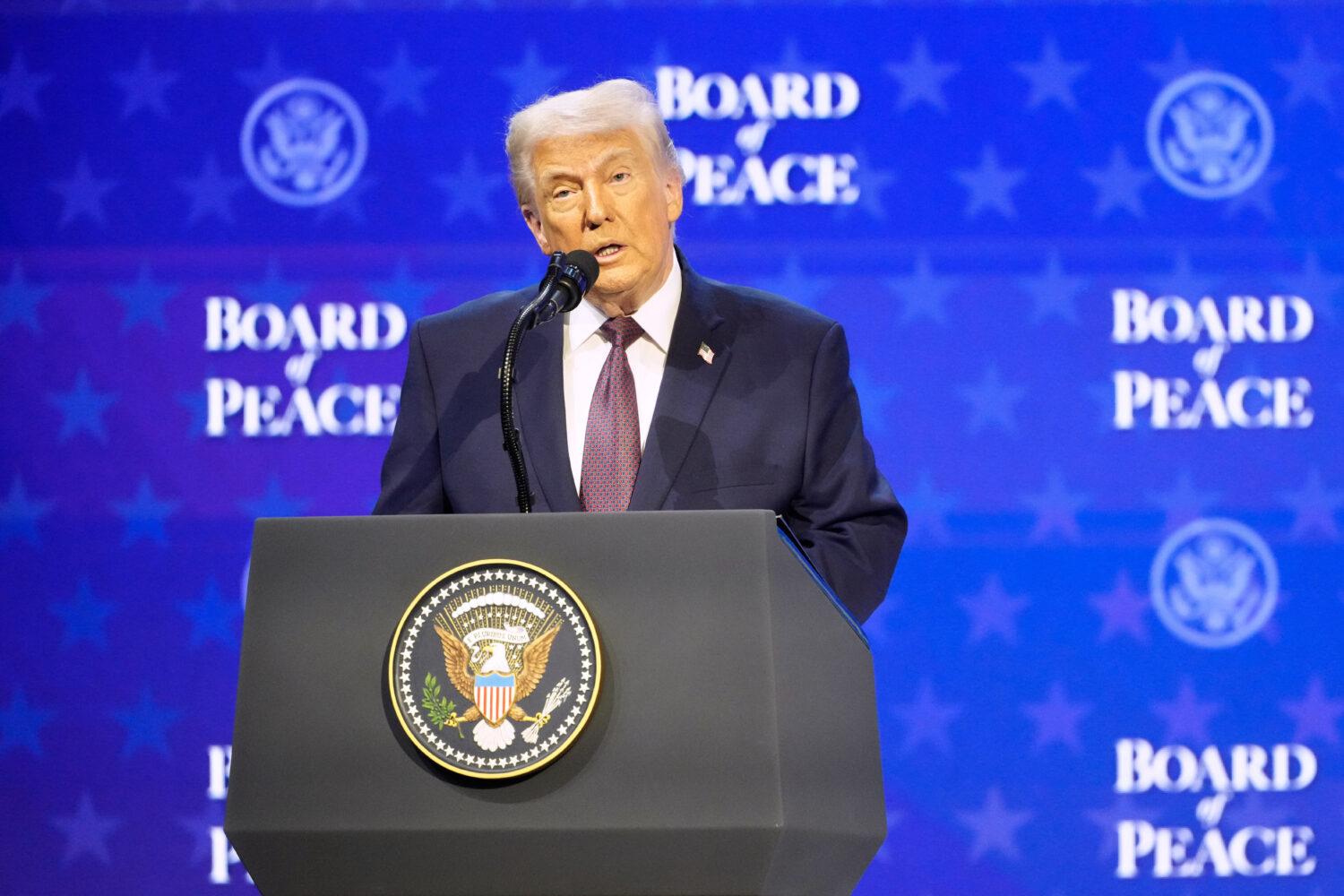 President Donald Trump speaks during a session on his Board of Peace initiative at the Annual Meeti...