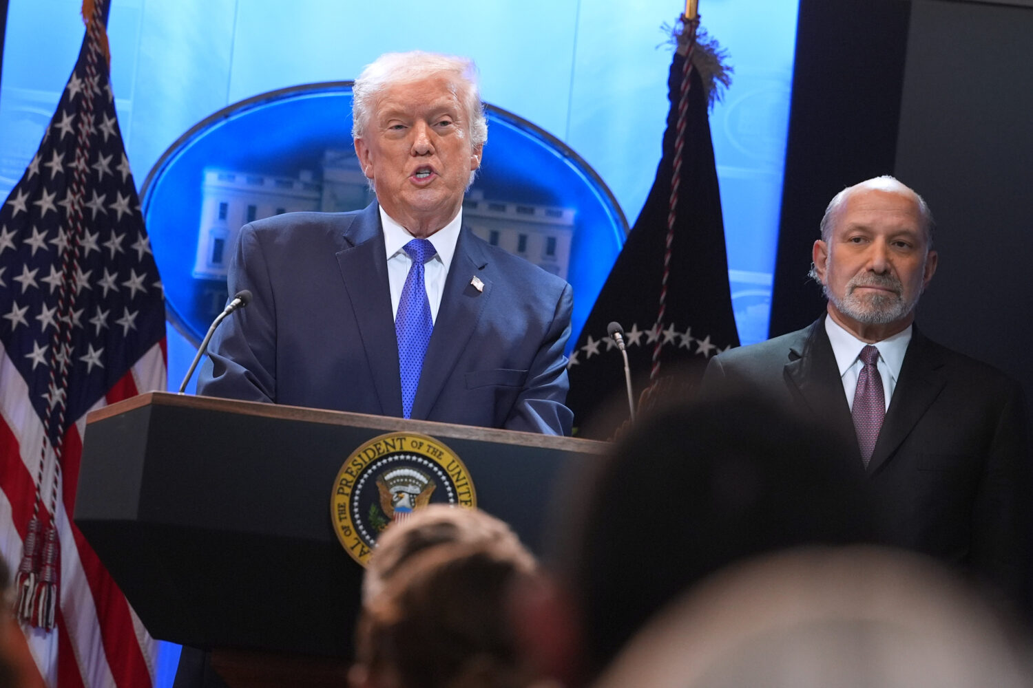 President Donald Trump speaks during a press briefing at the White House, Friday, Feb. 20, 2026, in...