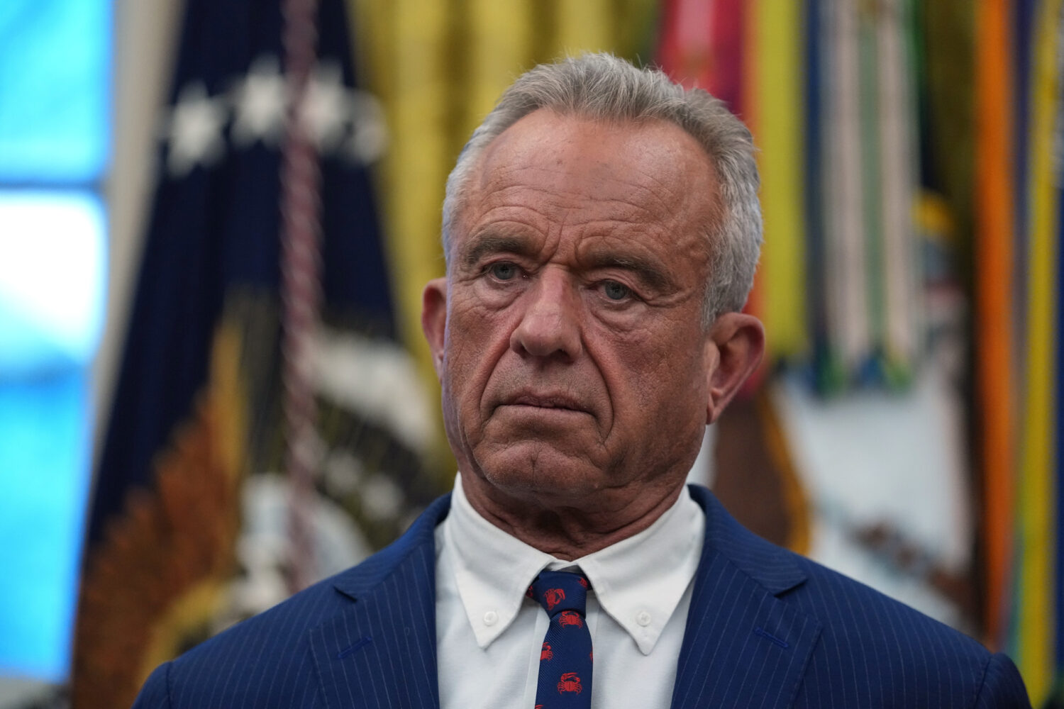 Health and Human Services Secretary Robert F. Kennedy Jr. listens as President Donald Trump speaks ...