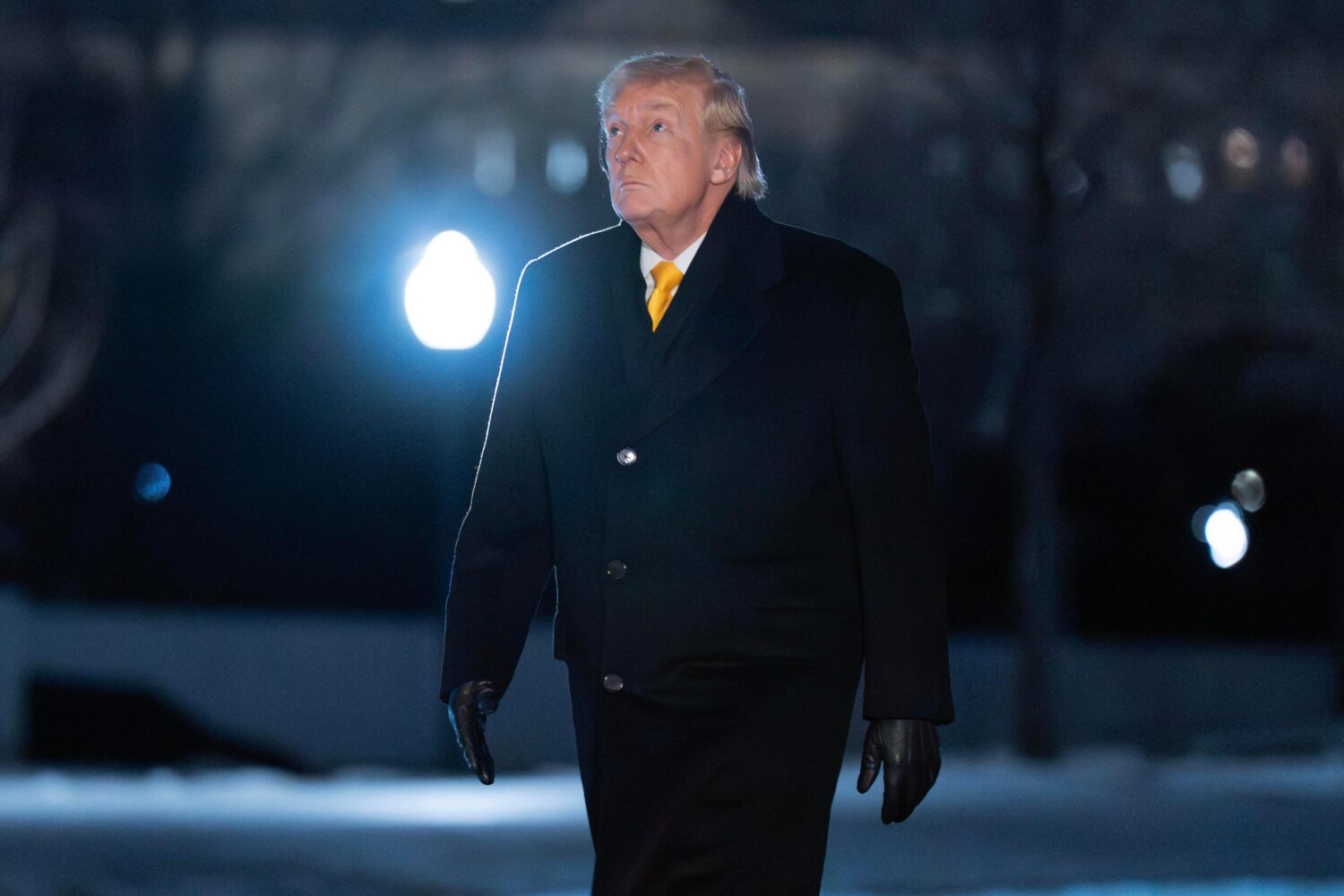President Donald Trump walks on the South Lawn upon his arrival to the White House, Monday, Feb. 9,...