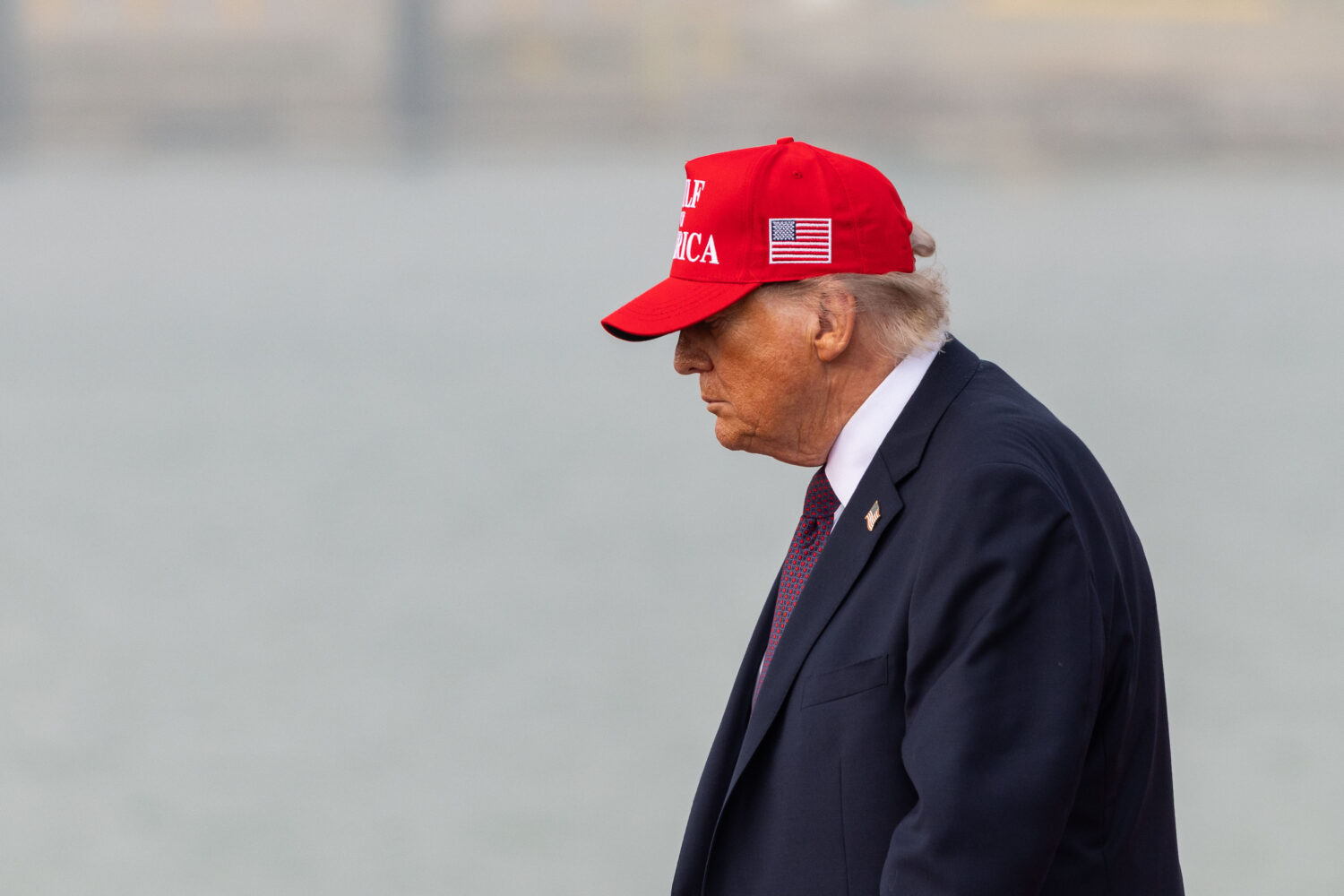 President Donald Trump leaves the stage after speaking at the Port of Corpus Christi in Corpus Chri...