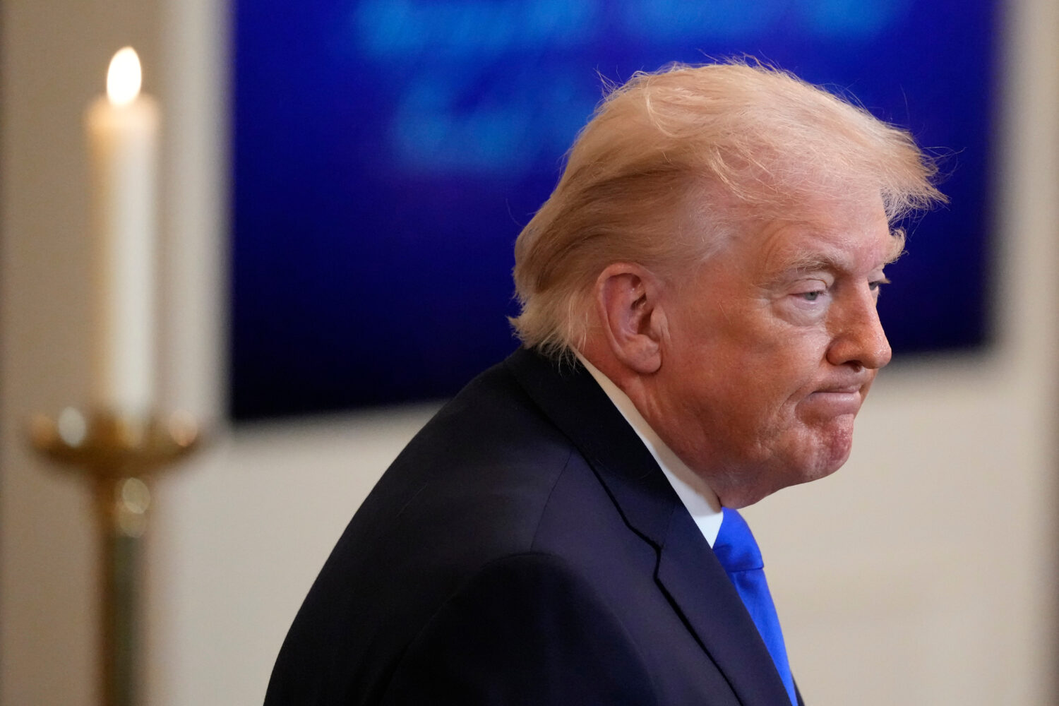 President Donald Trump leaves after an event to proclaim "Angel Family Day" in the East Room of the...