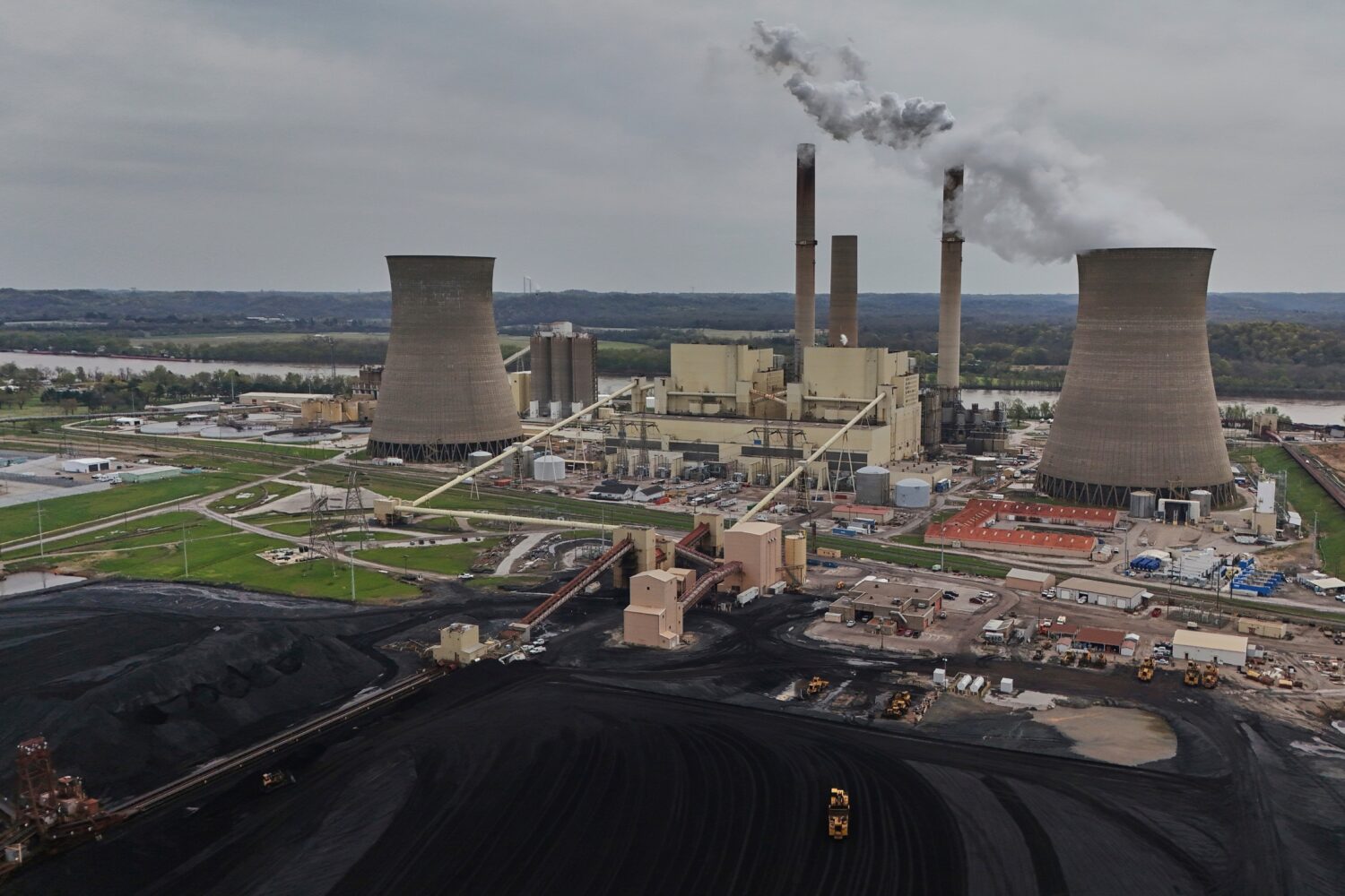 FILE - The Gen. James Gavin Power Plant, a coal-fired power plant, operates April 14, 2025, in Ches...