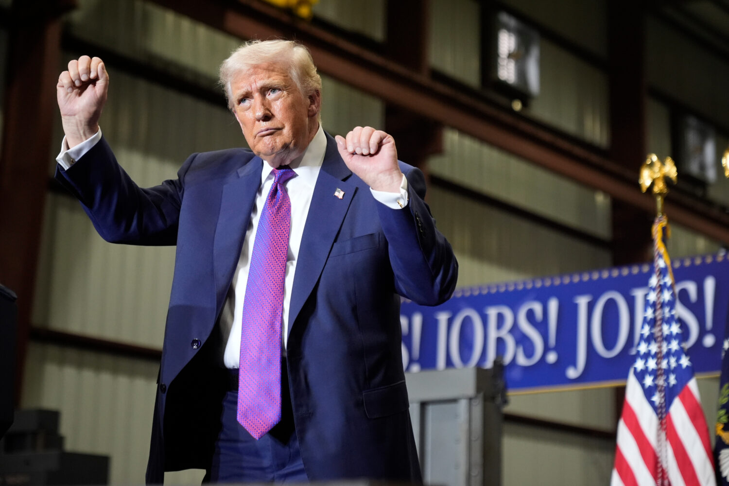 President Donald Trump dances after speaking at a rally at Coosa Steel Corporation in Rome, Ga., Th...
