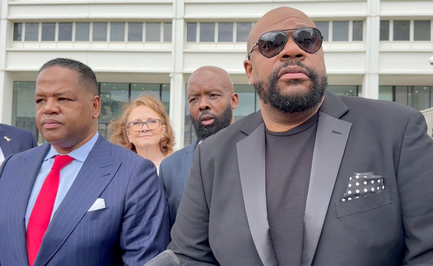 FILE - Isaac Hayes III, right, and his attorney address reporters outside a federal courthouse in A...