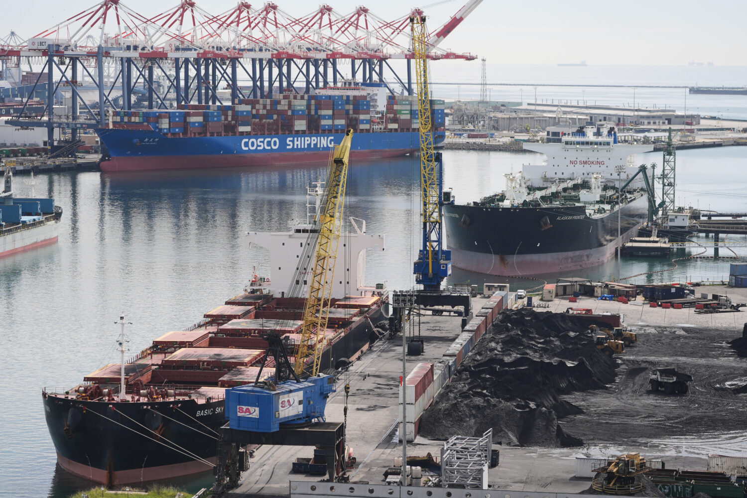 Ships are docked at the Port of Long Beach Friday, Feb. 20, 2026, in Long Beach, Calif. (AP Photo/D...