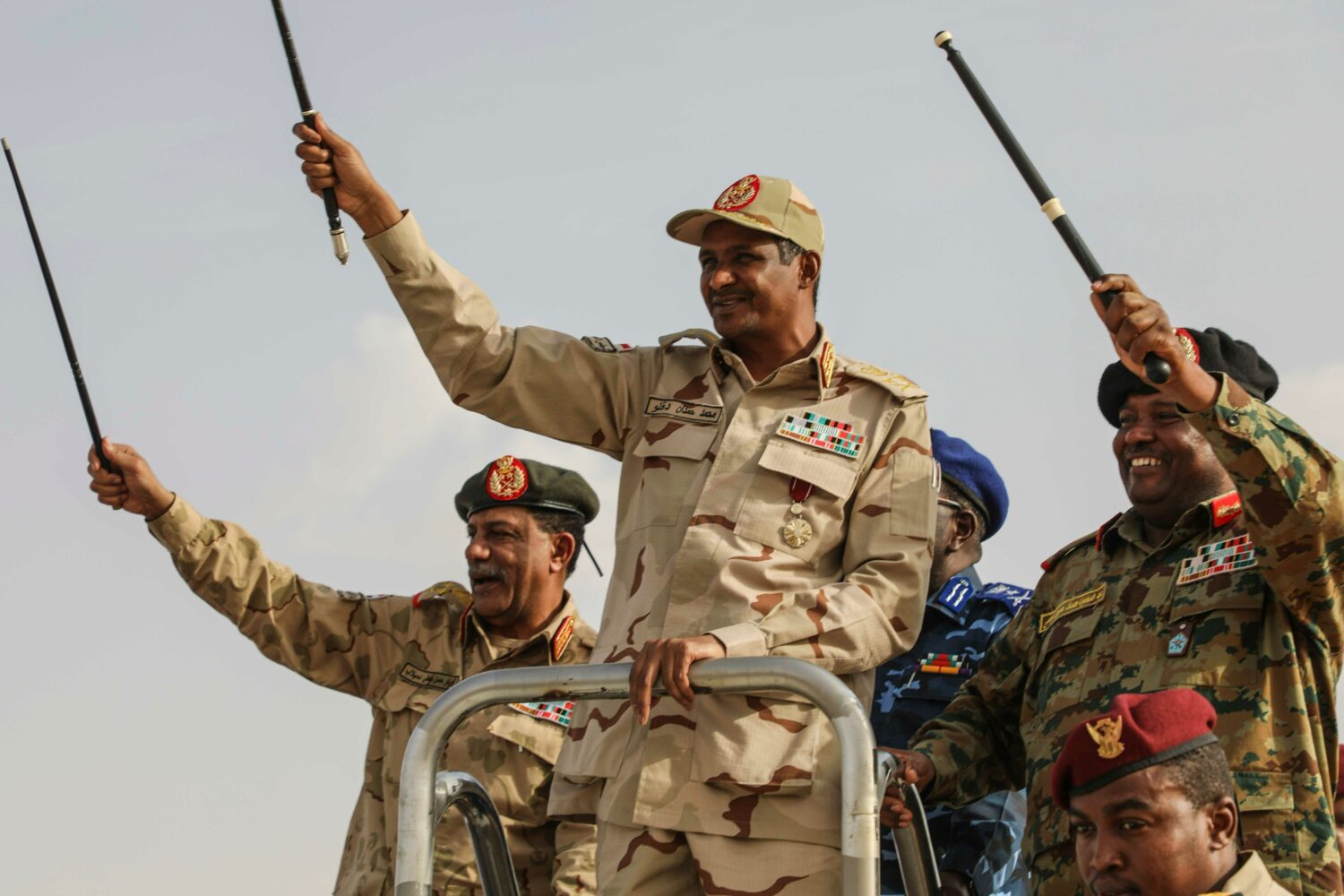 FILE - Gen. Mohammed Hamdan Dagalo, center, greets the crowd during a military-backed tribes' rally...