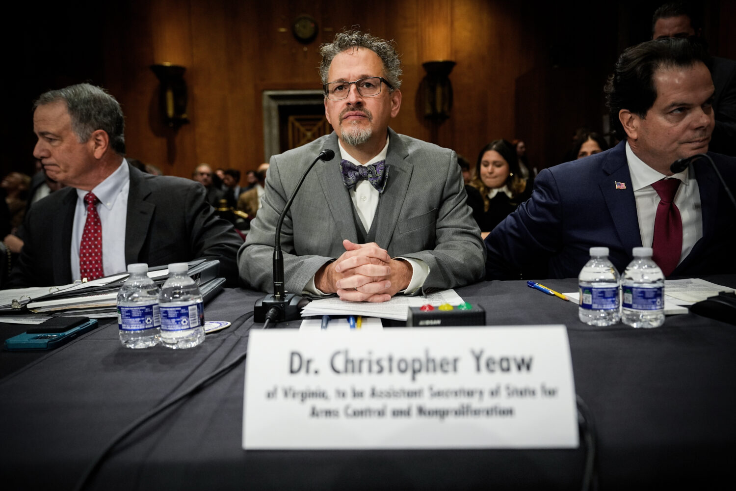 FILE - Christopher Yeaw, center, arrives to a Senate Foreign Relations Committee confirmation heari...