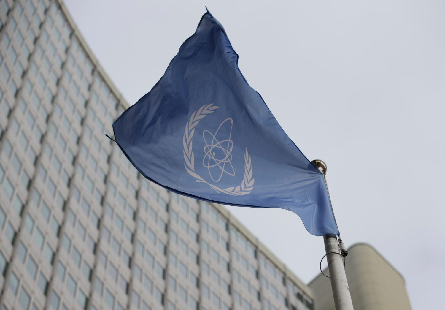 FILE - The flag of the International Atomic Energy Agency flies in front of its headquarters during...