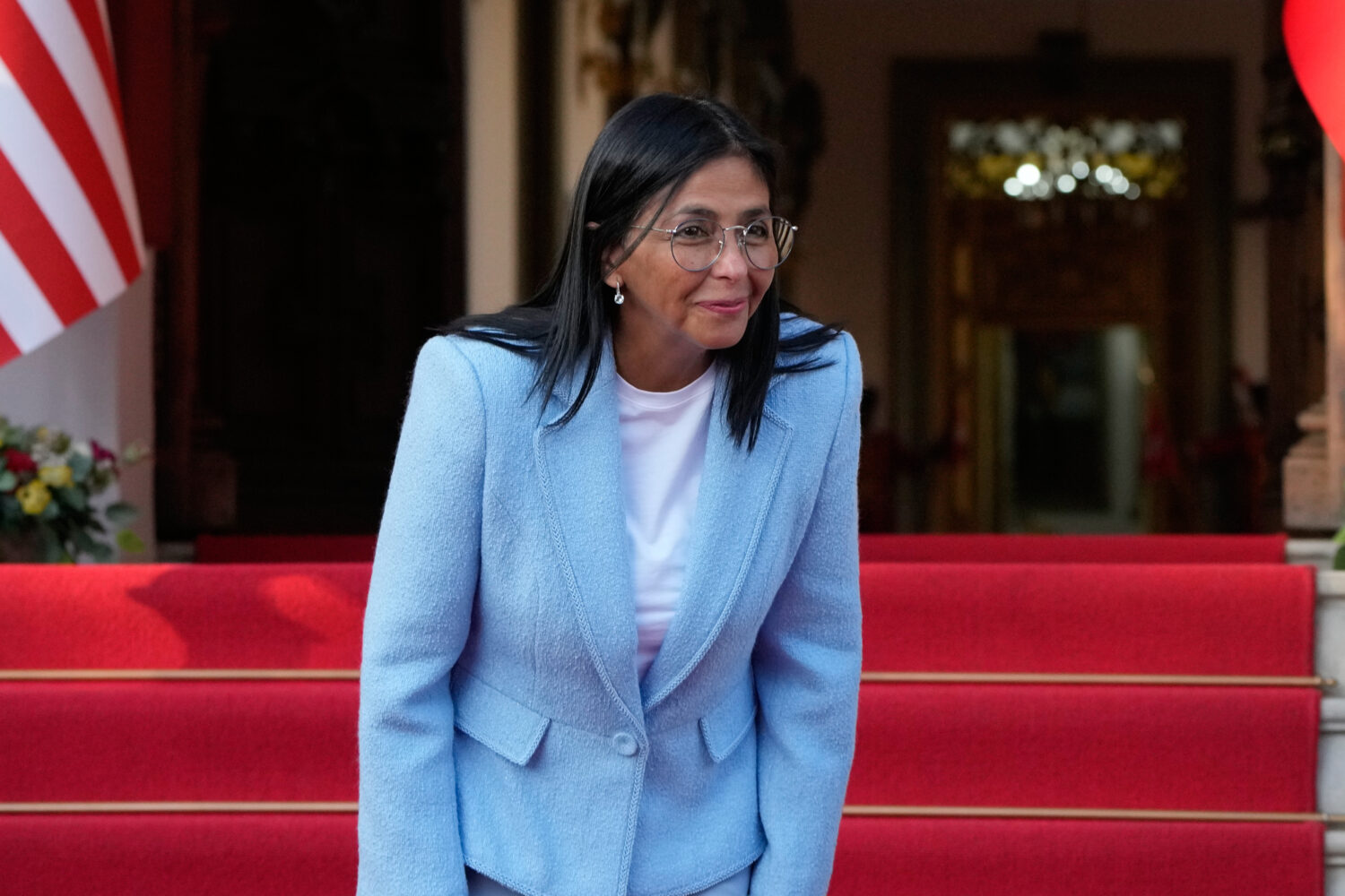 Venezuela's acting President Delcy Rodriguez smiles after bidding farewell to U.S. Energy Secretary...