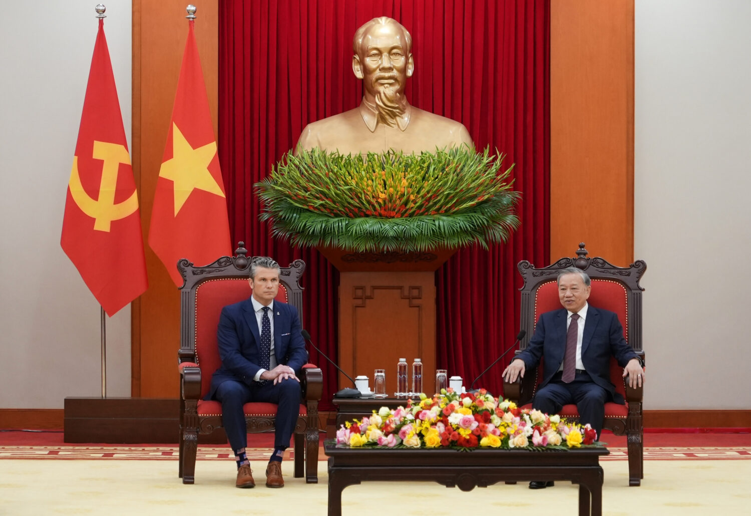 FILE - U.S. Defense Secretary Pete Hegseth, left, and General Secretary of Vietnam's Communist Part...