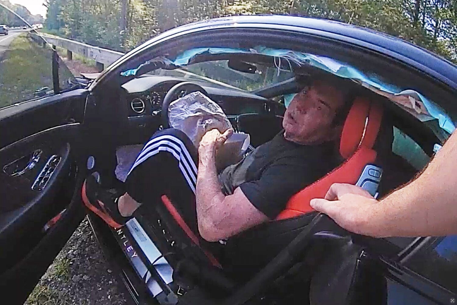 In an image taken from Connecticut State Police police bodycam video, Vince McMahon is questioned i...