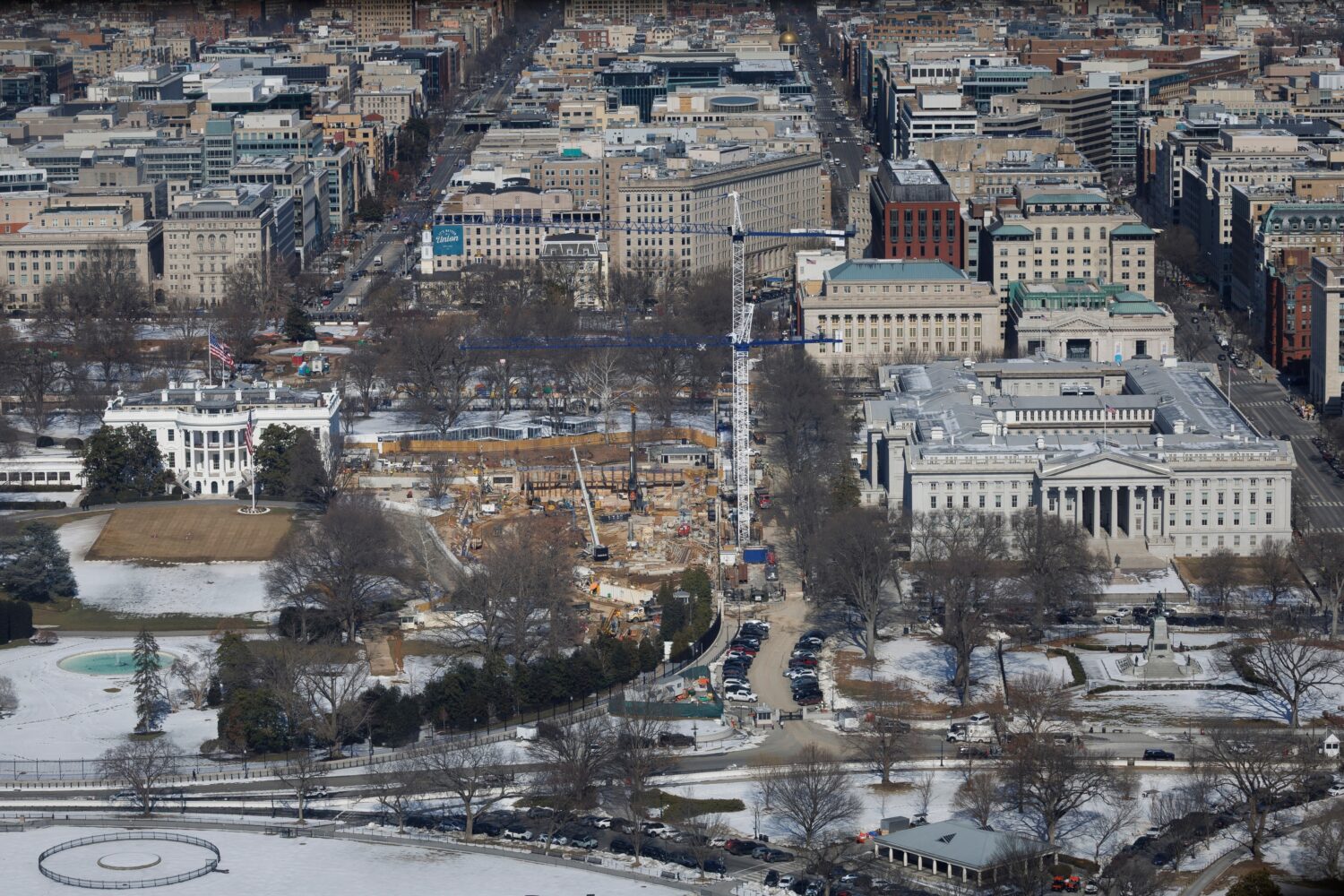 Constriction continues on the ballroom where the East Wing used to stand at the White House, Friday...