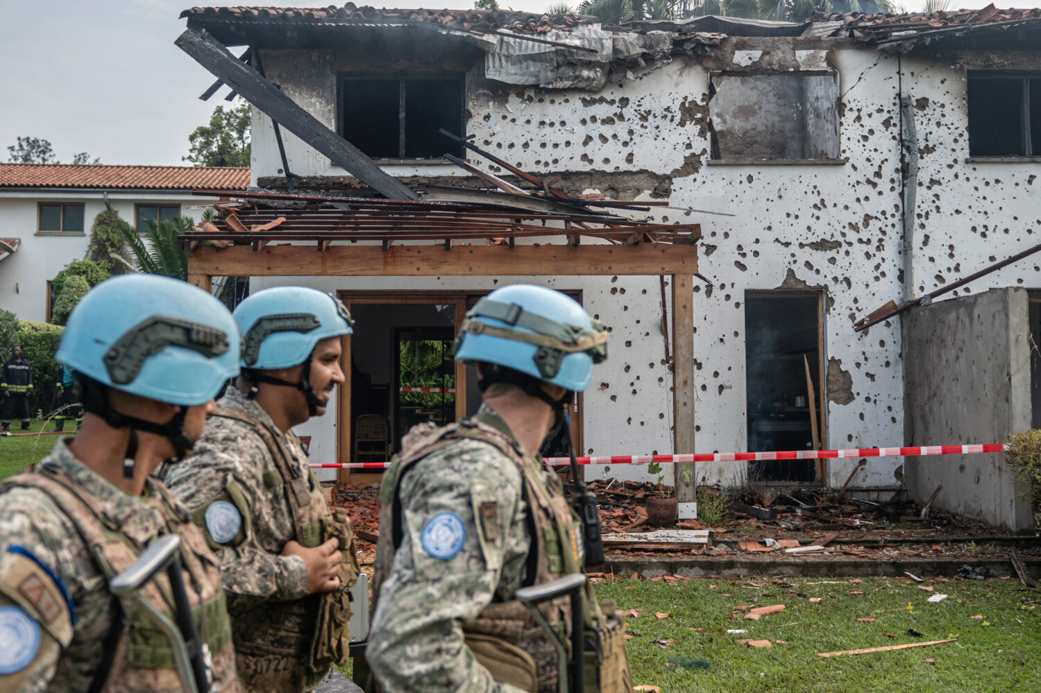 U.N peacekeepers guard a house hit by a drone strike in Goma, Democratic Republic of Congo, Wednesd...