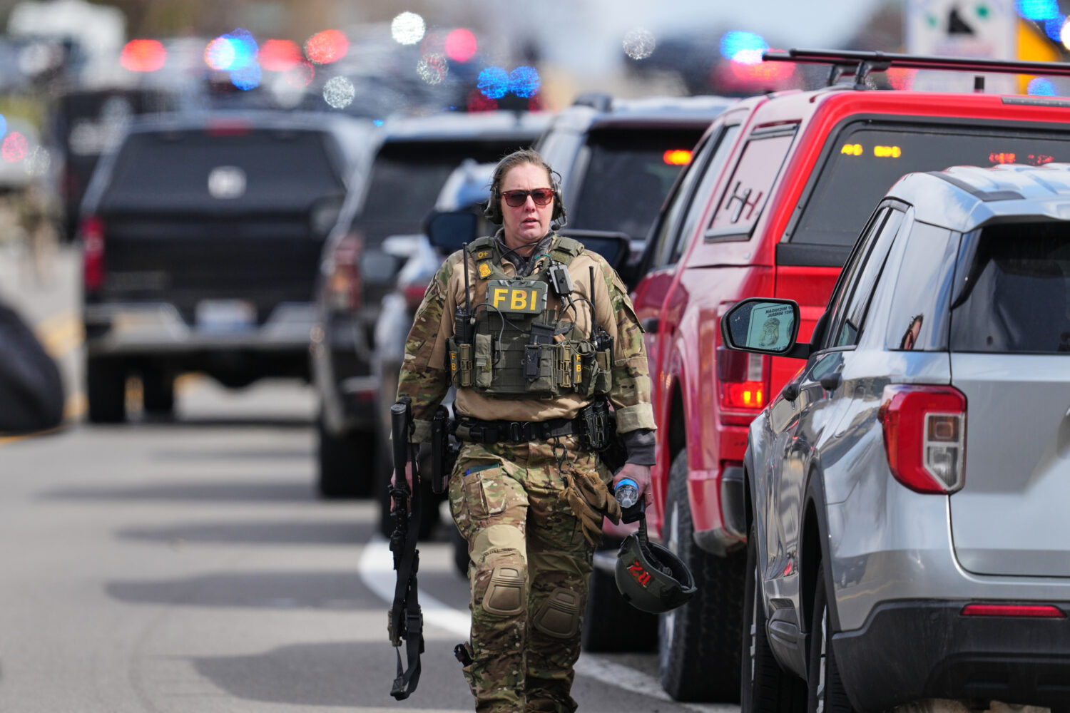 Law enforcement respond to a call at Temple Israel synagogue Thursday, March 12, 2026, in West Bloo...