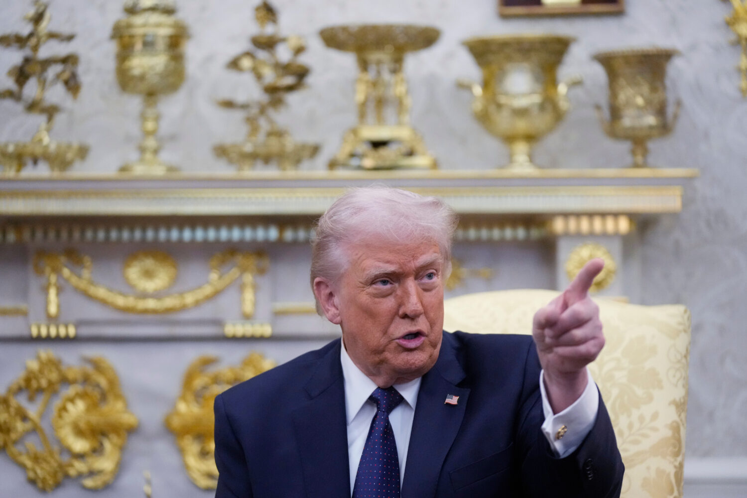President Donald Trump speaks during a meeting with German Chancellor Friedrich Merz in the Oval Of...