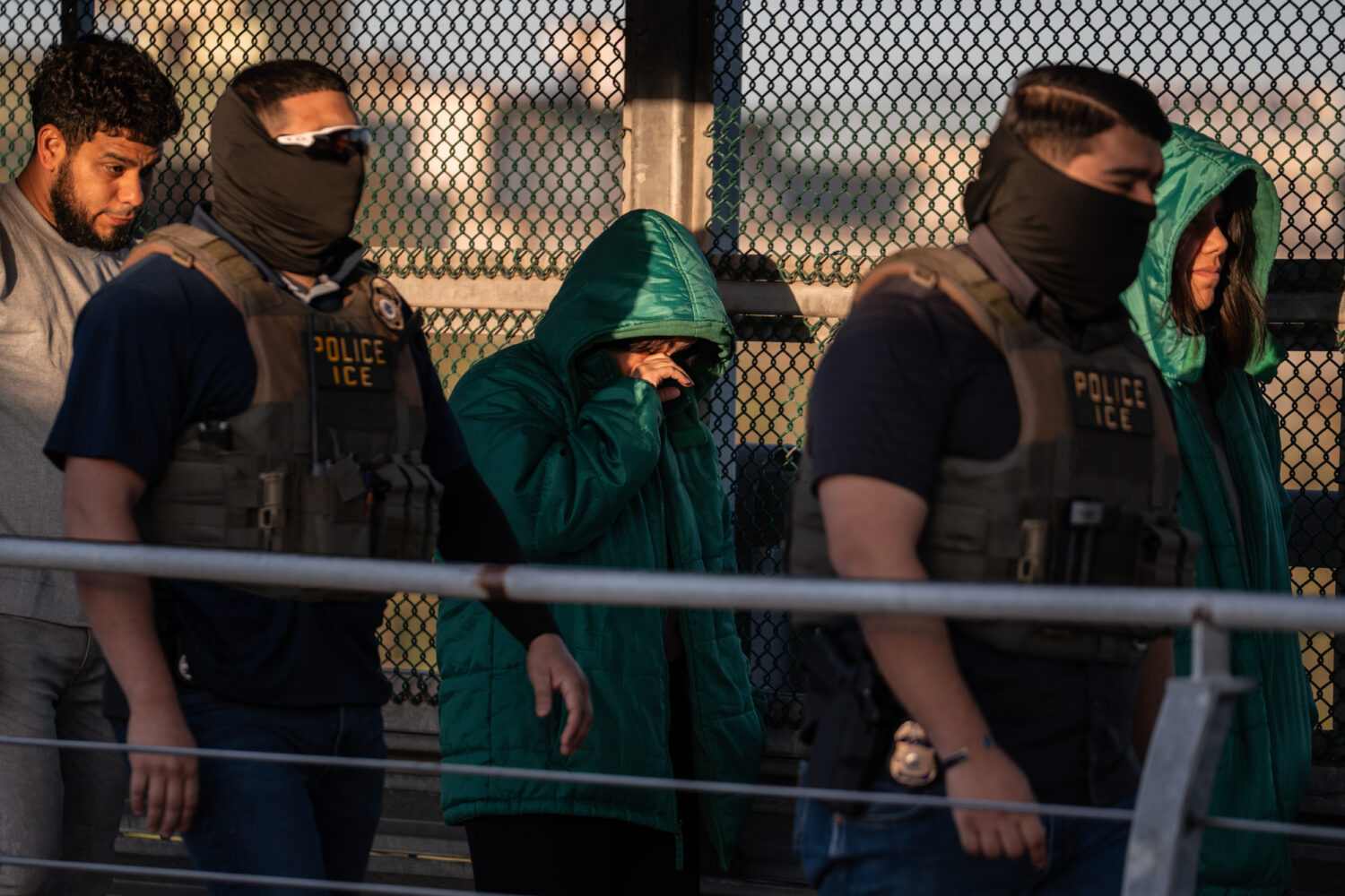 A group of undocumented migrants is deported by U.S. Immigration and Customs Enforcement agents acr...