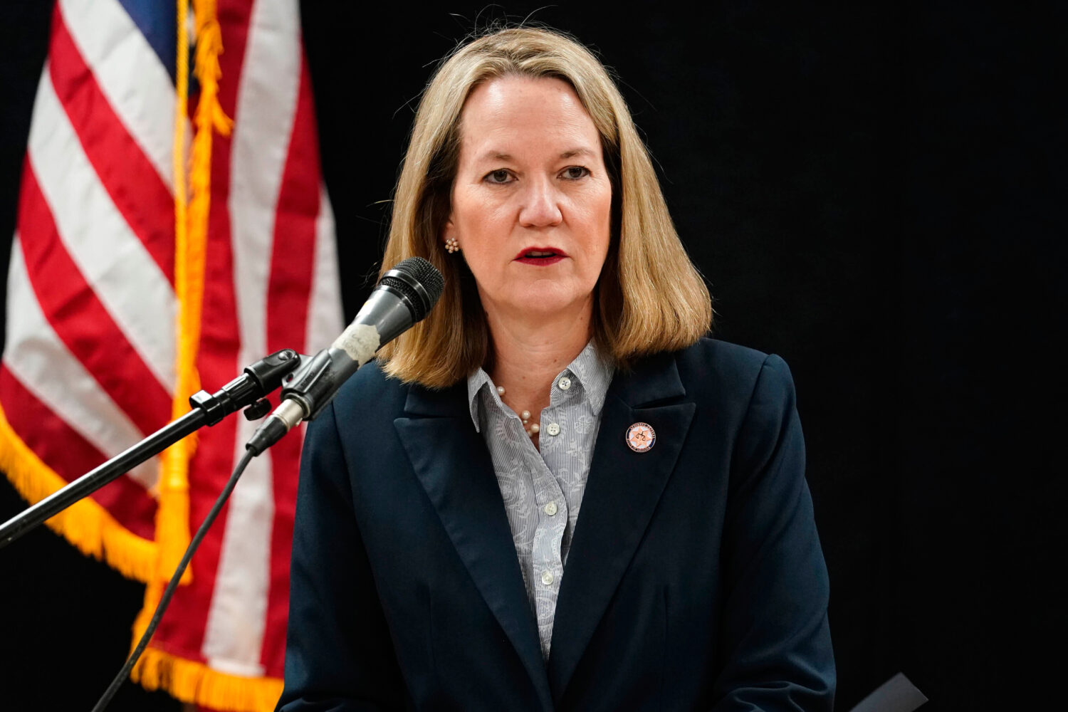 FILE - Arizona Attorney General Kris Mayes speaks at the Arizona State Prison, March 19, 2025, in F...