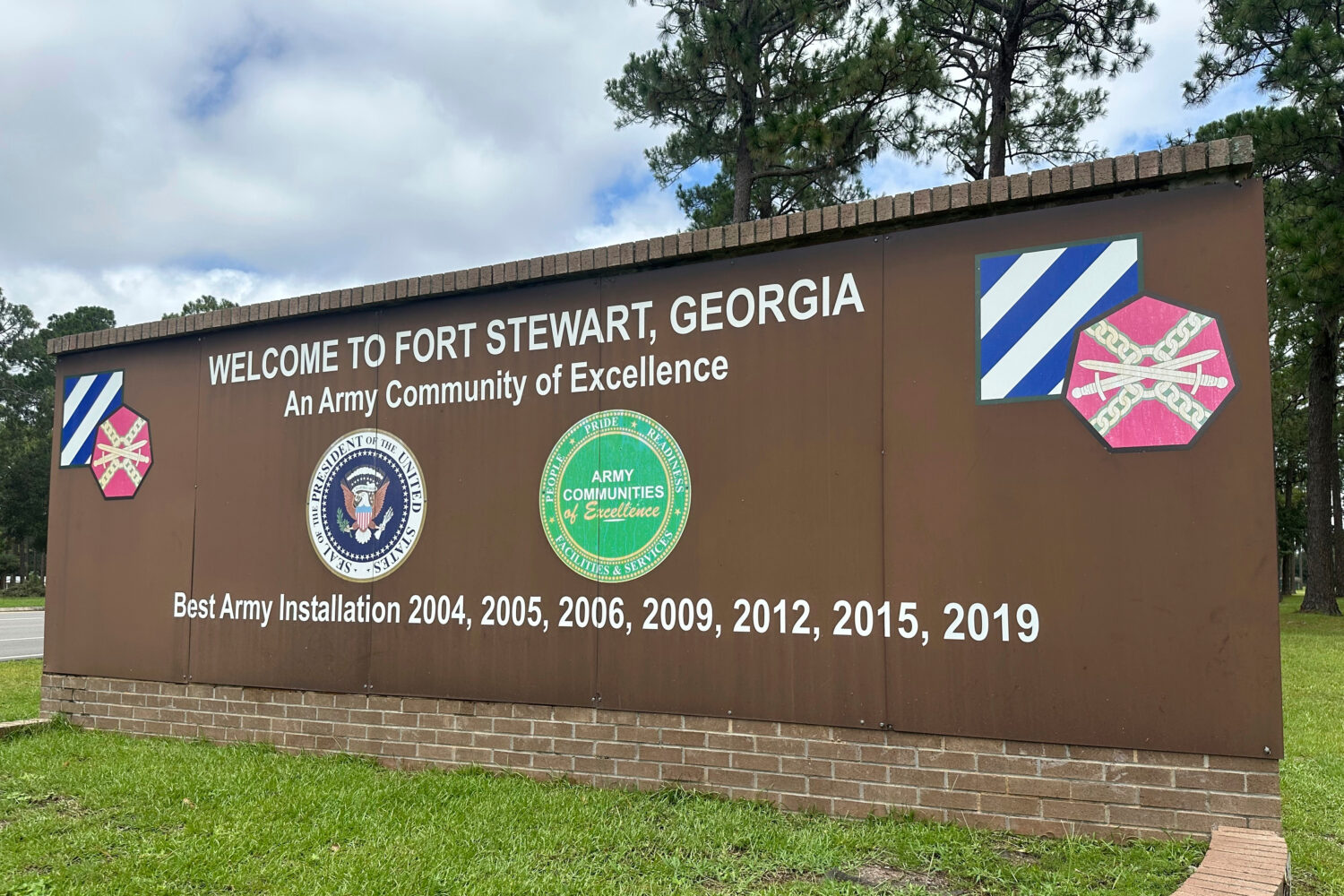 FILE - A sign outside the main gate of Fort Stewart, Ga., is shown Aug. 6, 2025. (AP Photo/Russ Byn...
