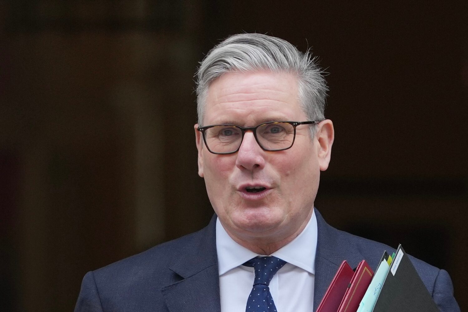 Britain's Prime Minister Keir Starmer leaves 10 Downing Street to attend the weekly Prime Ministers...