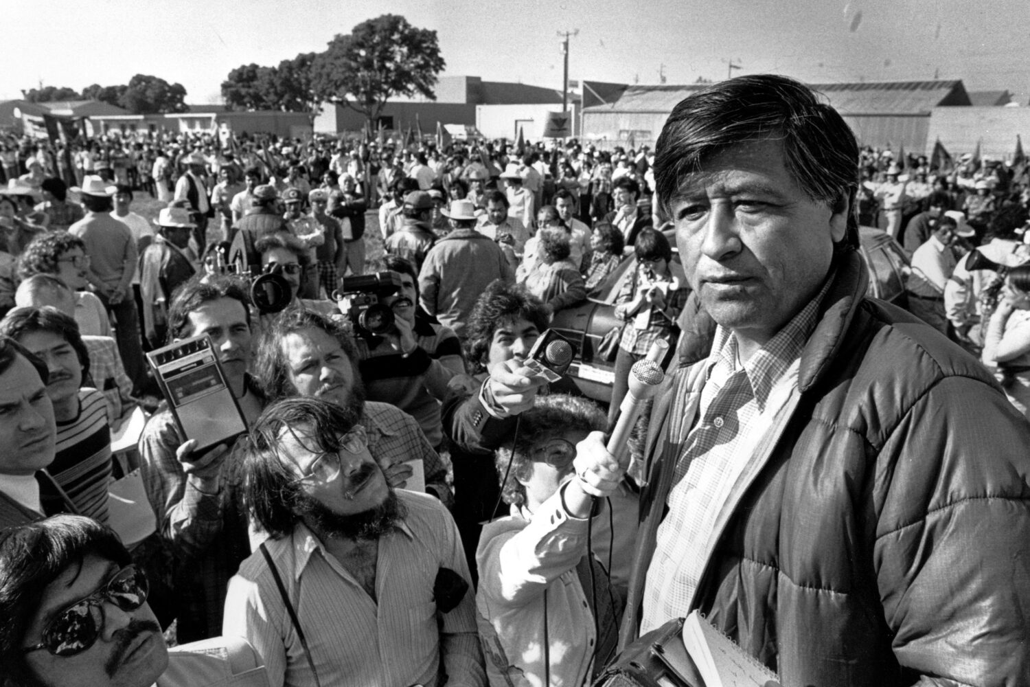 FILE - United Farm Workers President Cesar Chavez talks to striking Salinas Valley farmworkers duri...