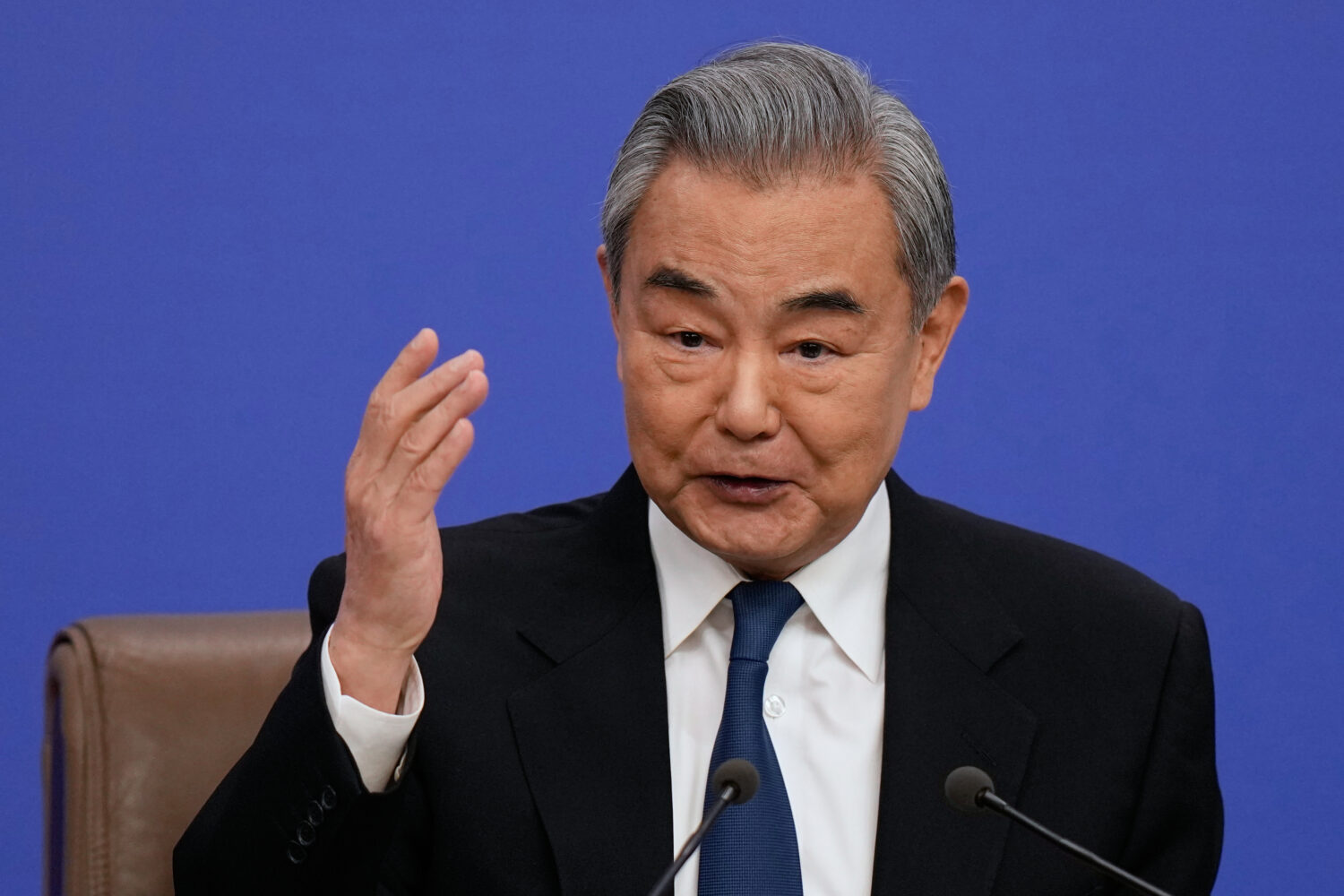 Chinese Foreign Minister Wang Yi speaks during a press conference on the sideline of the National P...