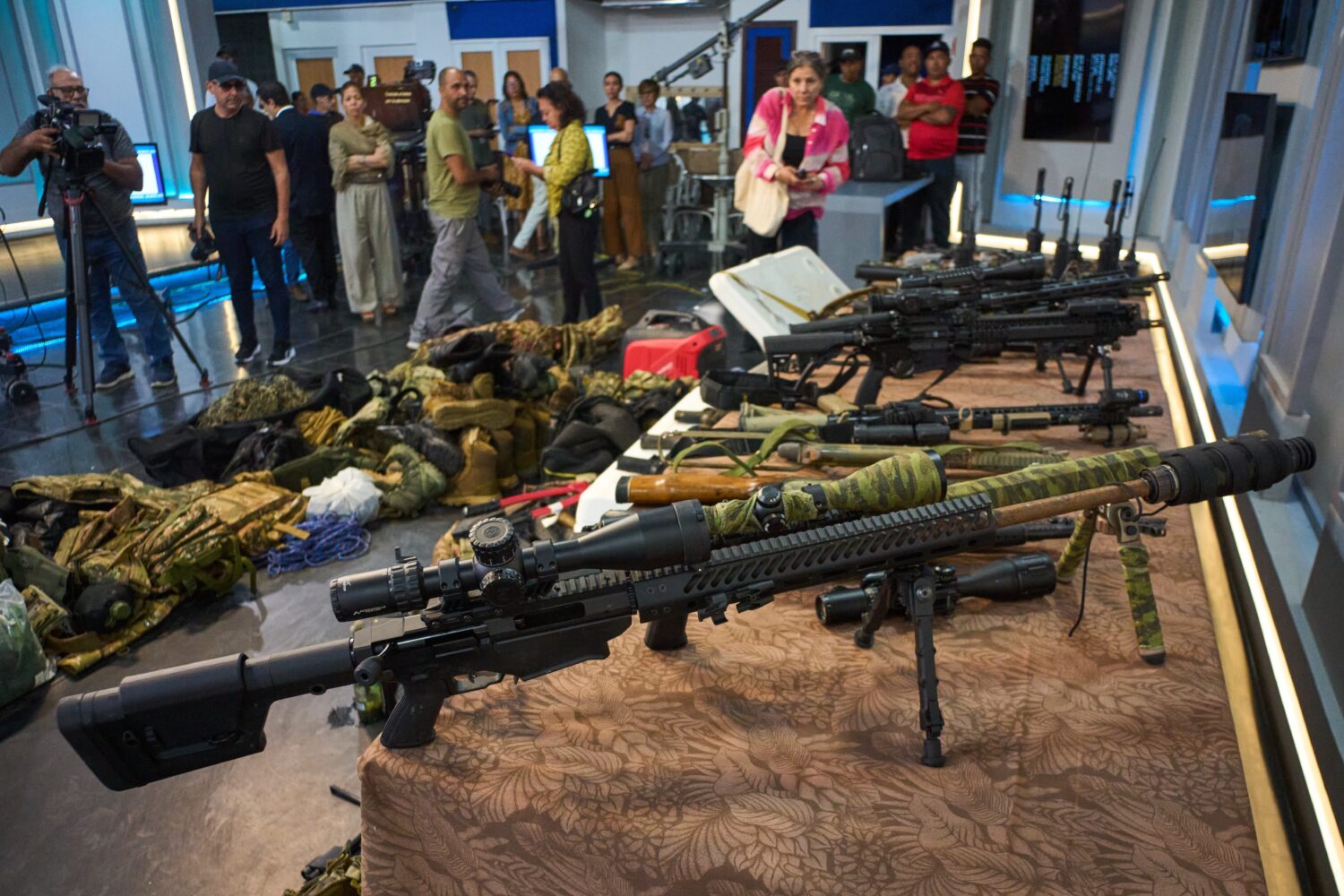 Weapons that Cuban authorities say were recovered from a speedboat in Cuban waters following a conf...