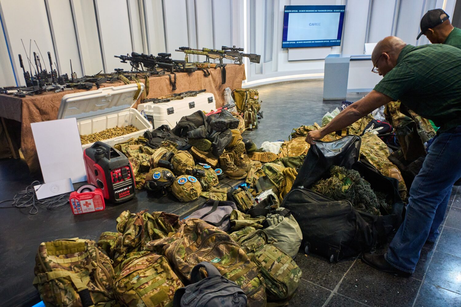 Weapons that Cuban authorities say were recovered from a speedboat in Cuban waters following a conf...