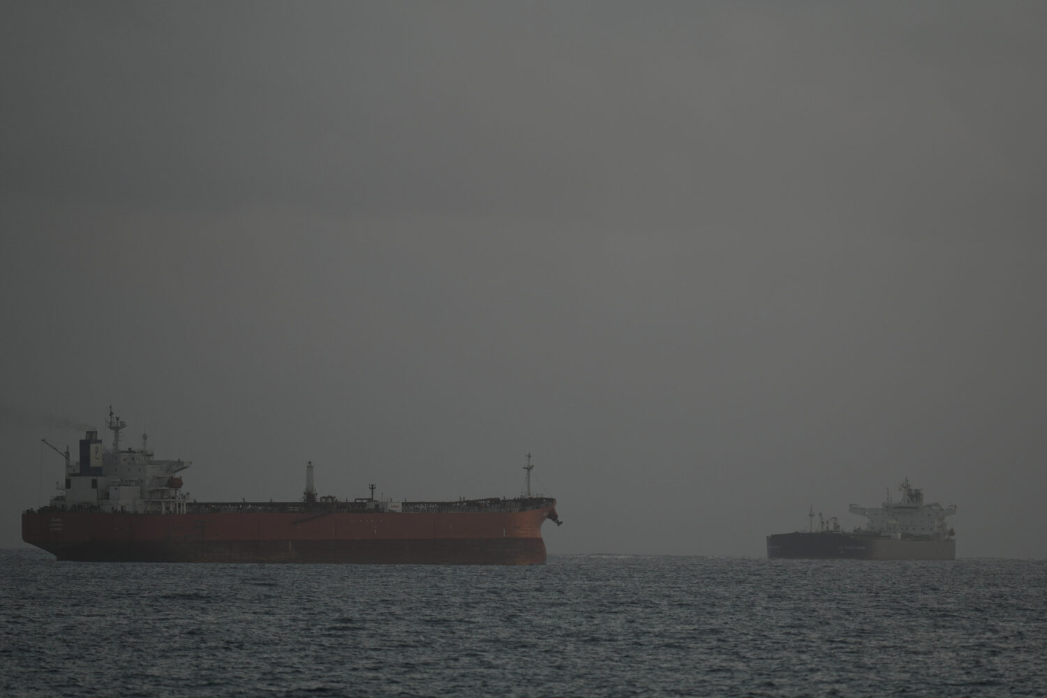 Russian-flagged oil tanker Anatoly Kolodki, right, approaches Matanzas, Cuba, Tuesday, March 31, 20...