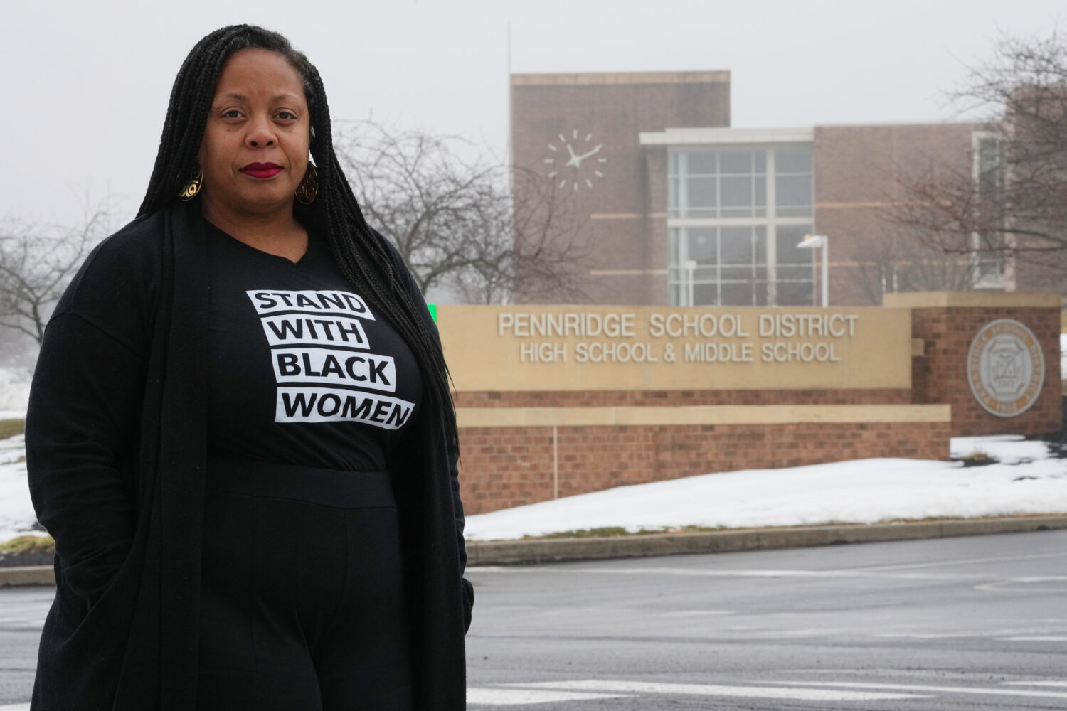 Adrienne King poses for a portrait in front of Pennridge School District's buildings in Perkasie, P...