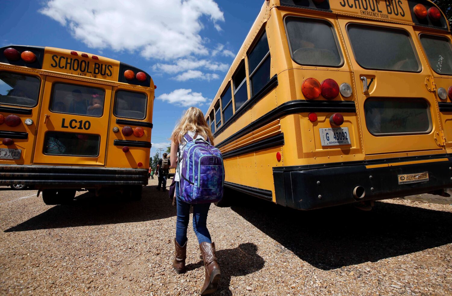 FILE - A student prepares to leave school, Aug. 13, 2014, southeast of Brookhaven, Miss. (AP Photo/...
