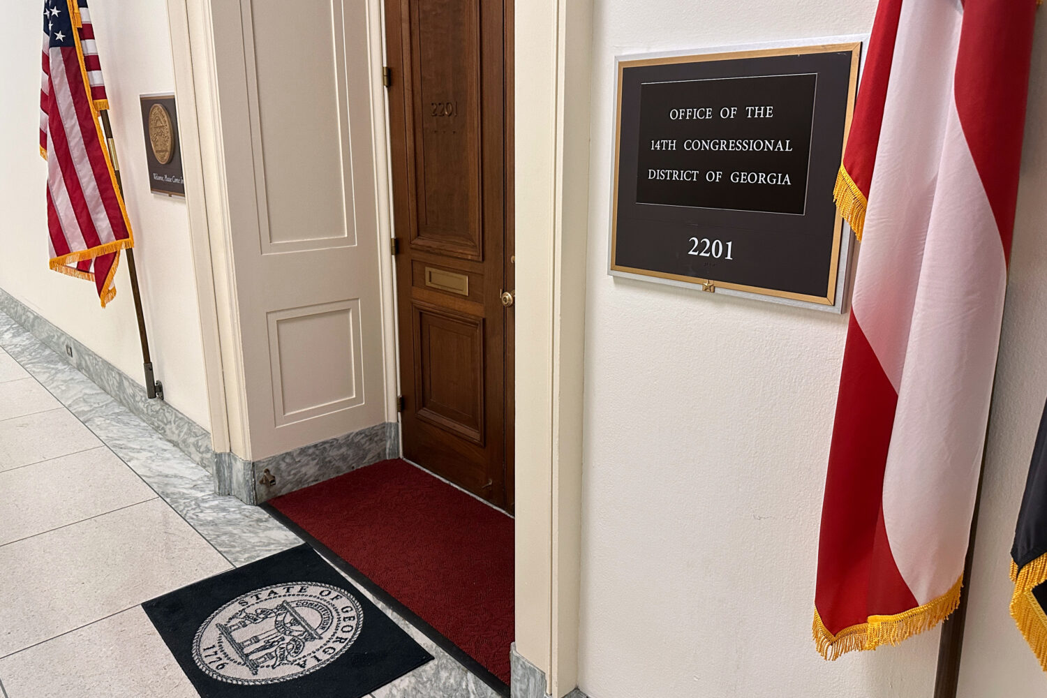 American flags are on display outside the Office of the 14th Congressional District of Georgia in t...