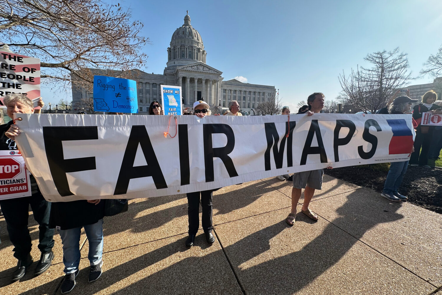 People opposed to new the U.S. House districts passed by the Missouri General Assembly demonstrate ...