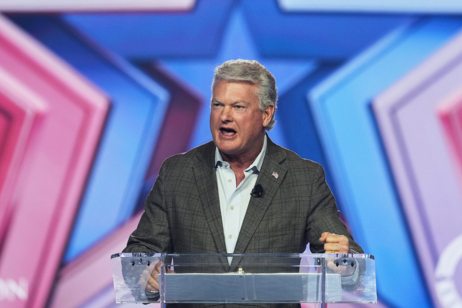 FILE - Rep. Mike Collins, R-Ga., speaks during Turning Point USA's AmericaFest 2025 on Dec. 20, 202...