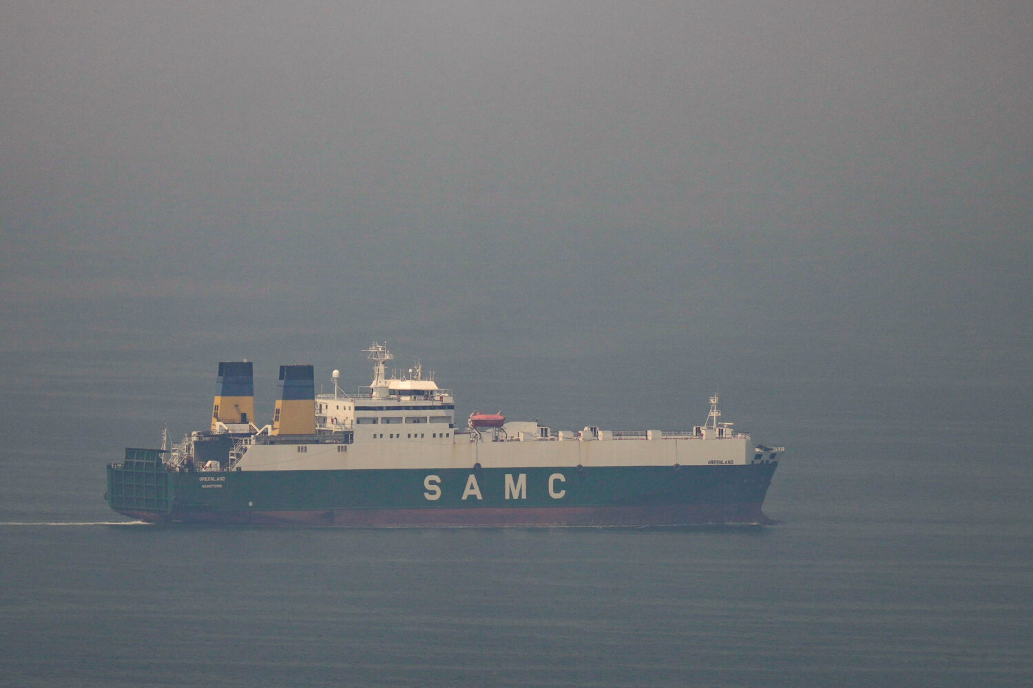A cargo ship sails in the Arabian Gulf towards Strait of Hormuz in United Arab Emirates, Sunday, Ma...