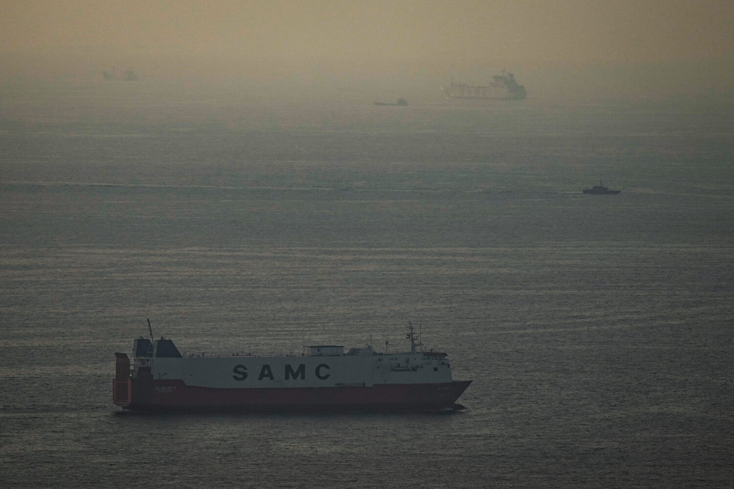 Cargo ships sail in the Arabian Gulf towards Strait of Hormuz in United Arab Emirates, Thursday, Ma...