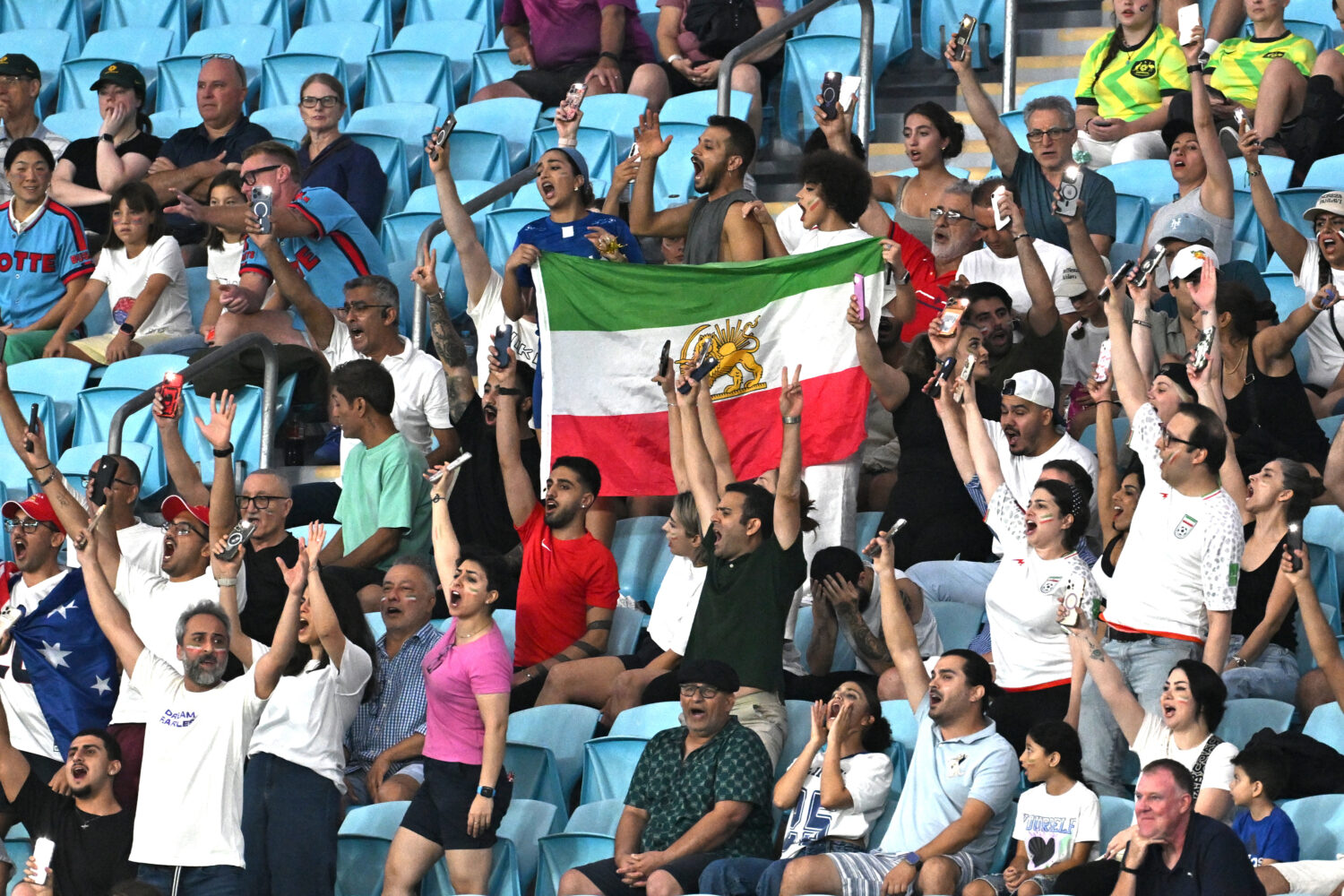 Iranian supporters react during the Women's Asia Cup soccer match between Iran and South Korea on t...