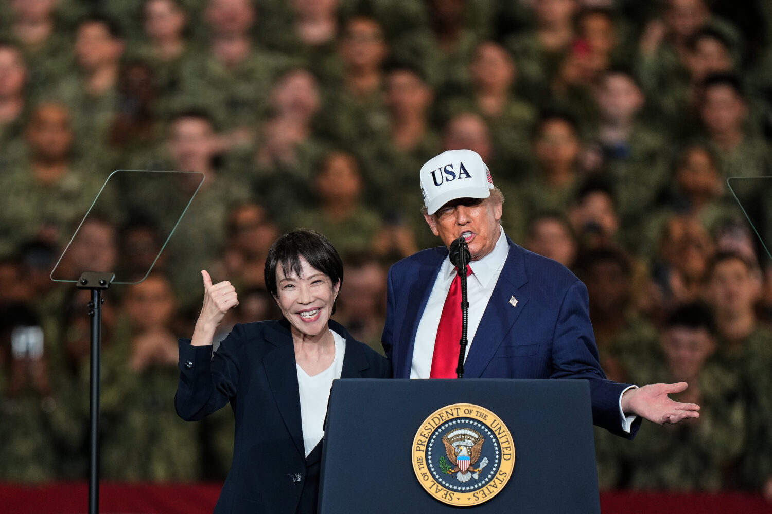 FILE - Japanese Prime Minister Sanae Takaichi gestures as U.S. President Donald Trump delivers his ...