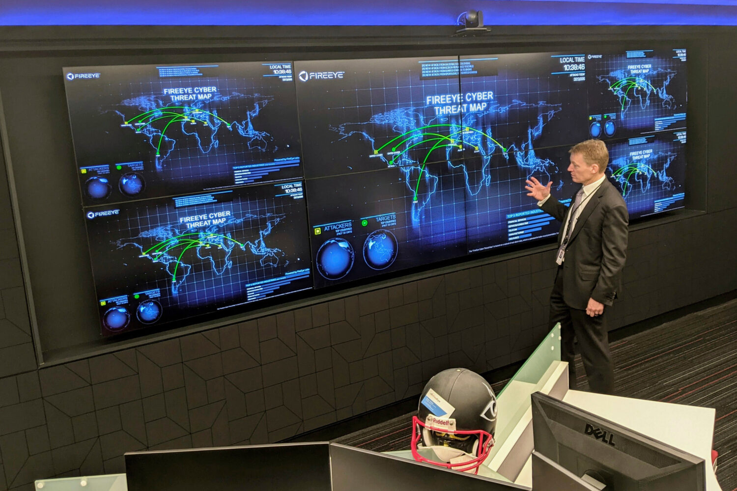 FILE - The CEO of FireEye Kevin Mandia gives a tour of the cybersecurity company's unused office sp...