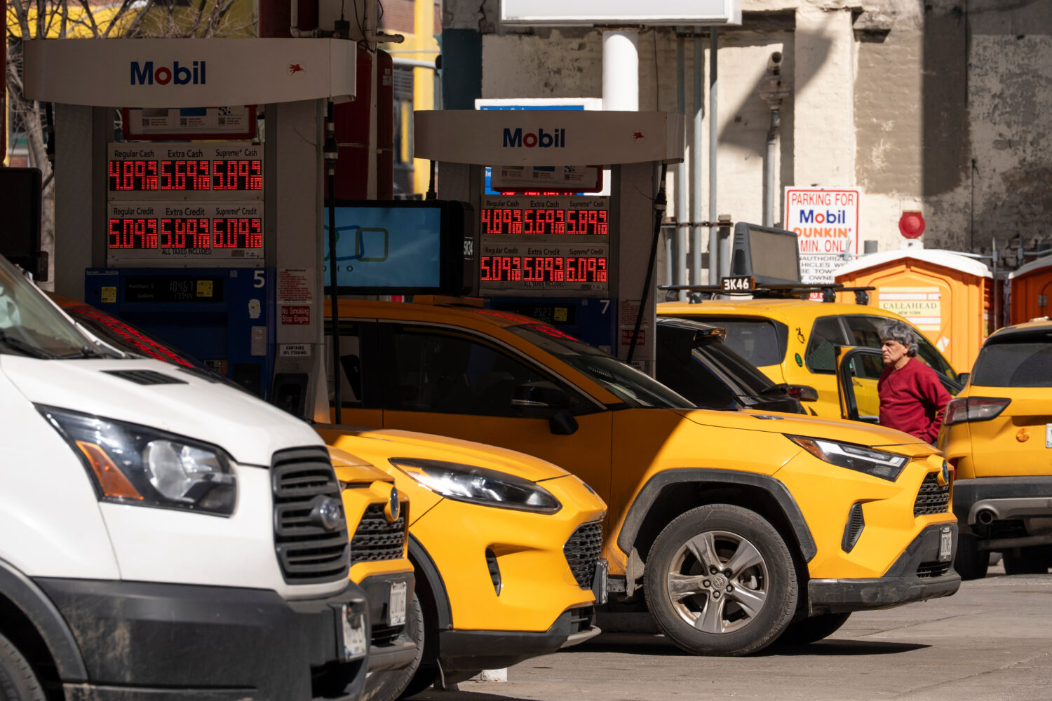 Signs show the gas prices at a gas station, Tuesday, March 10, 2026, in New York. (AP Photo/Yuki Iw...