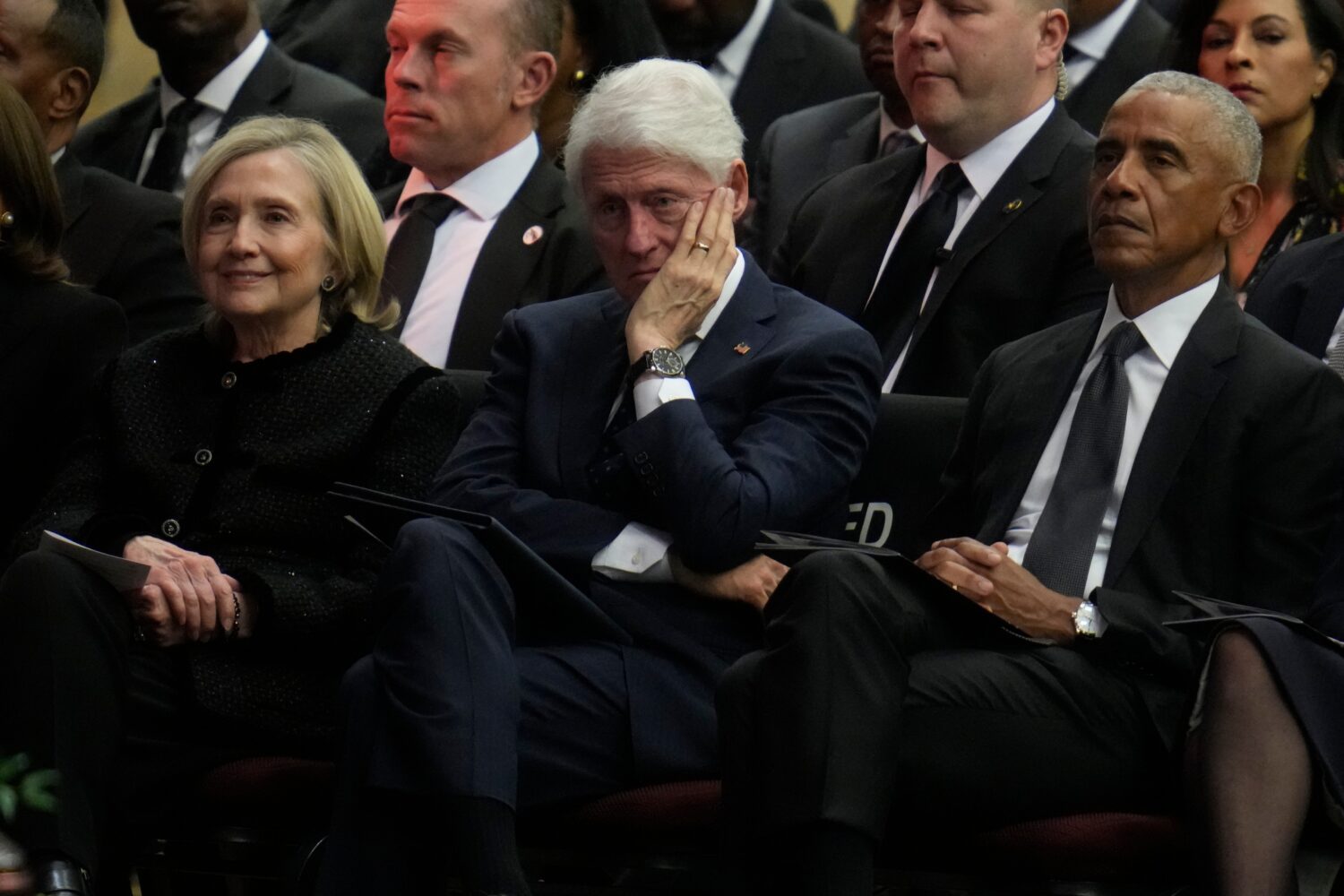 Former Secretary of State Hillary Clinton, former President Bill Clinton and former President Barac...