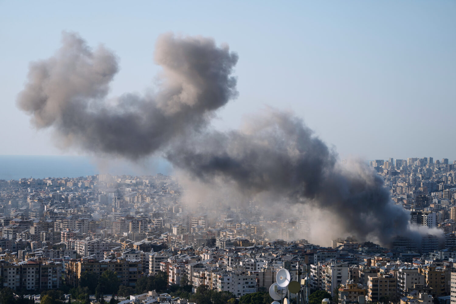 Smoke rise from an Israeli airstrike in Dahiyeh, Beirut's southern suburbs, Lebanon, Tuesday, March...