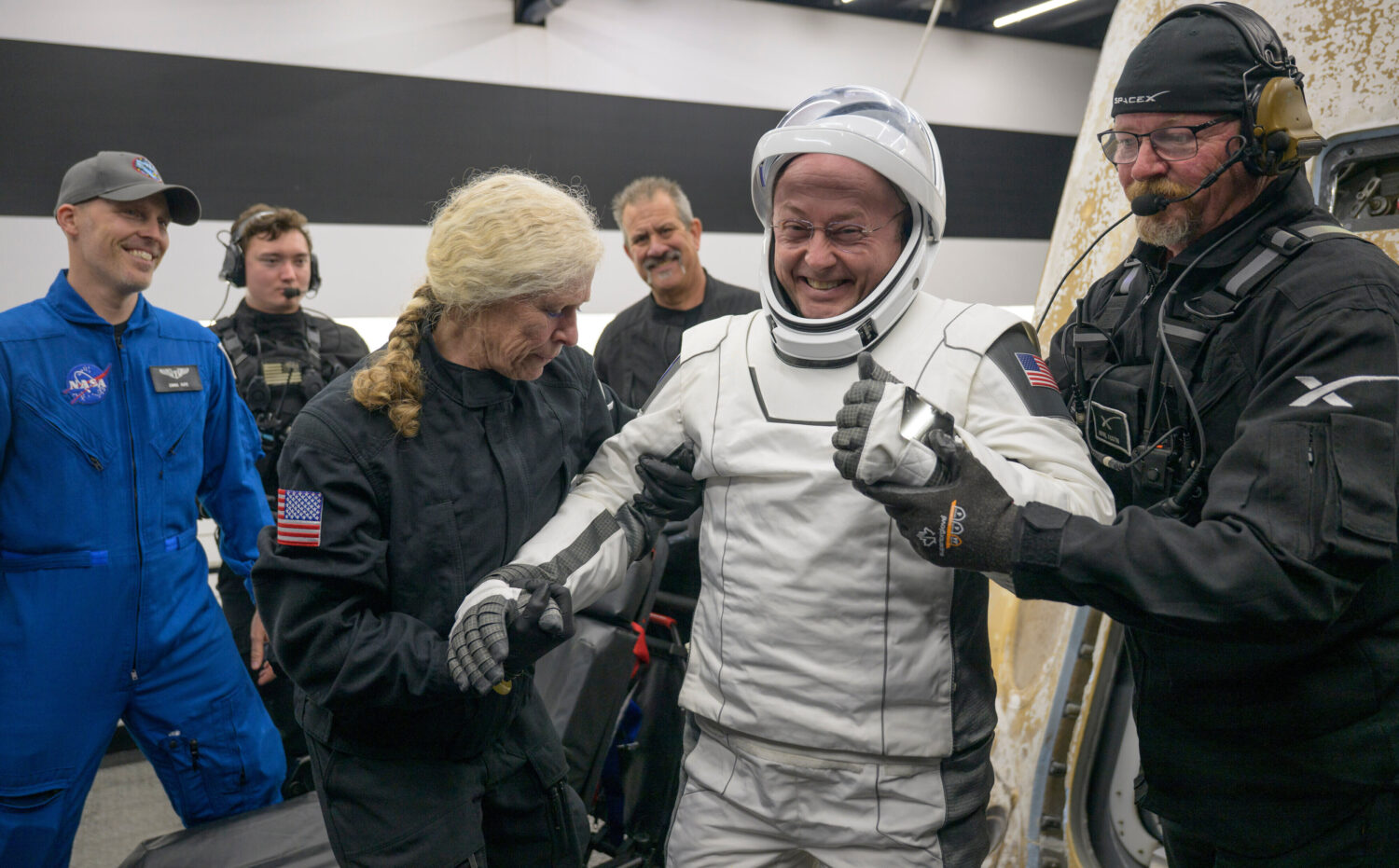 FILE - In his image provided by NASA, NASA astronaut Mike Fincke is helped out of the SpaceX Crew-1...
