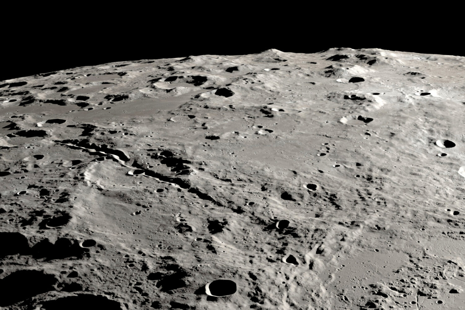 FILE - This undated photo provided by NASA shows a view from orbit looking at the surface of the mo...