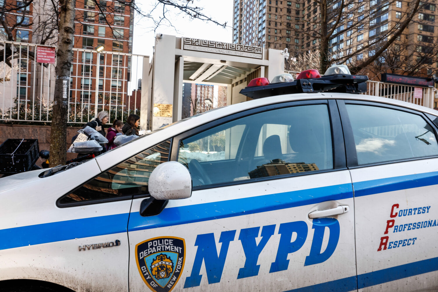 NYPD cars are seen outside the Slamic Cultural Center of New York, Saturday, Feb. 28, 2026, in New ...