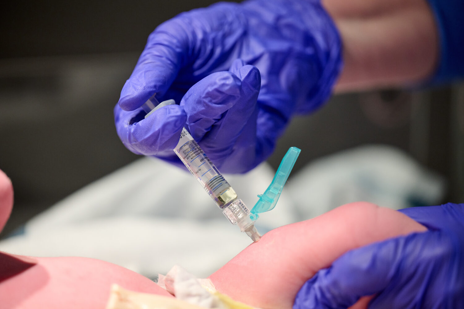 In this photo provided by Norton Healthcare, nurse Robin Waldridge administers a Vitamin K shot to ...
