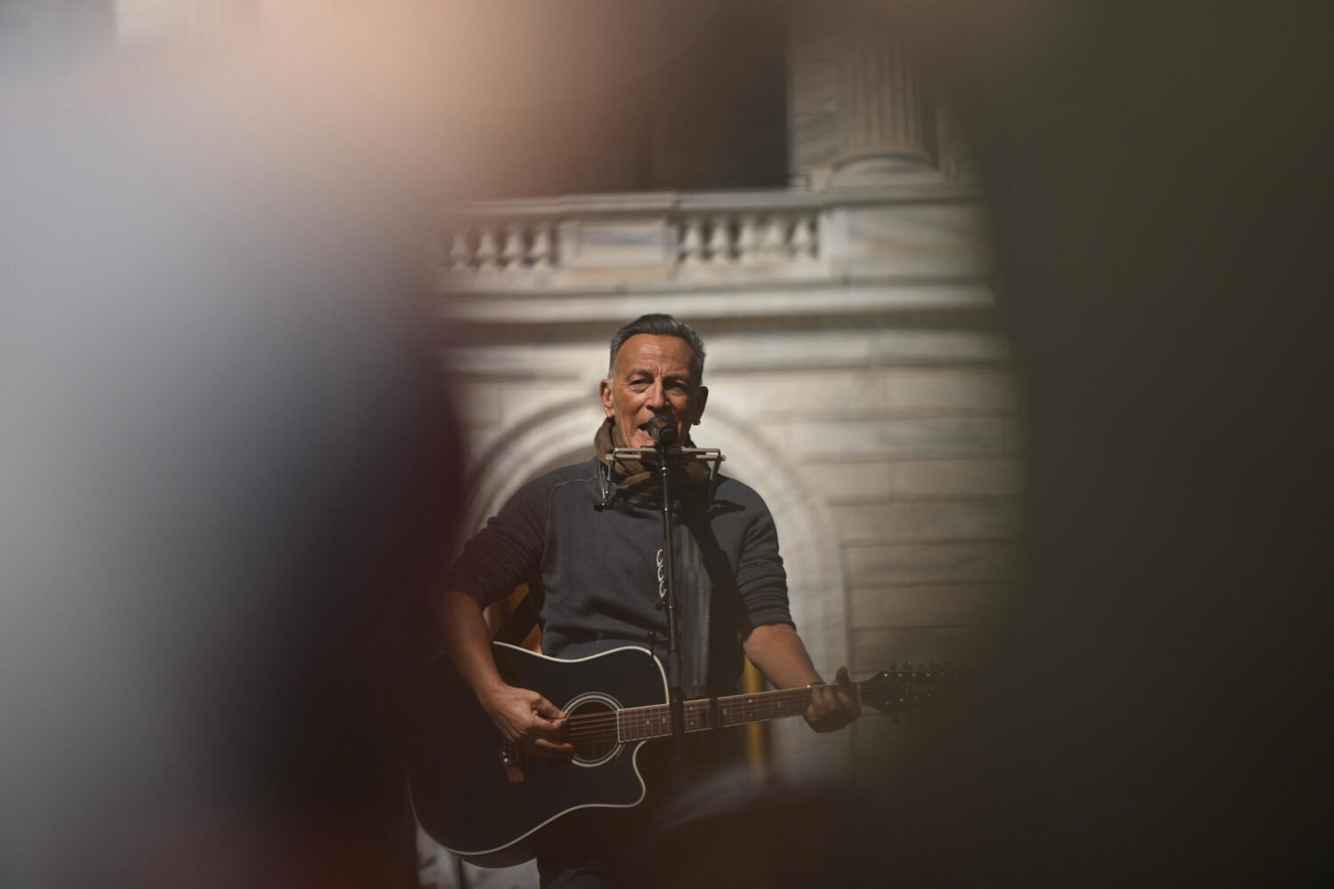 Bruce Springsteen performs during tthe "No Kings" protest Saturday, March 28, 2026, in St. Paul, Mi...