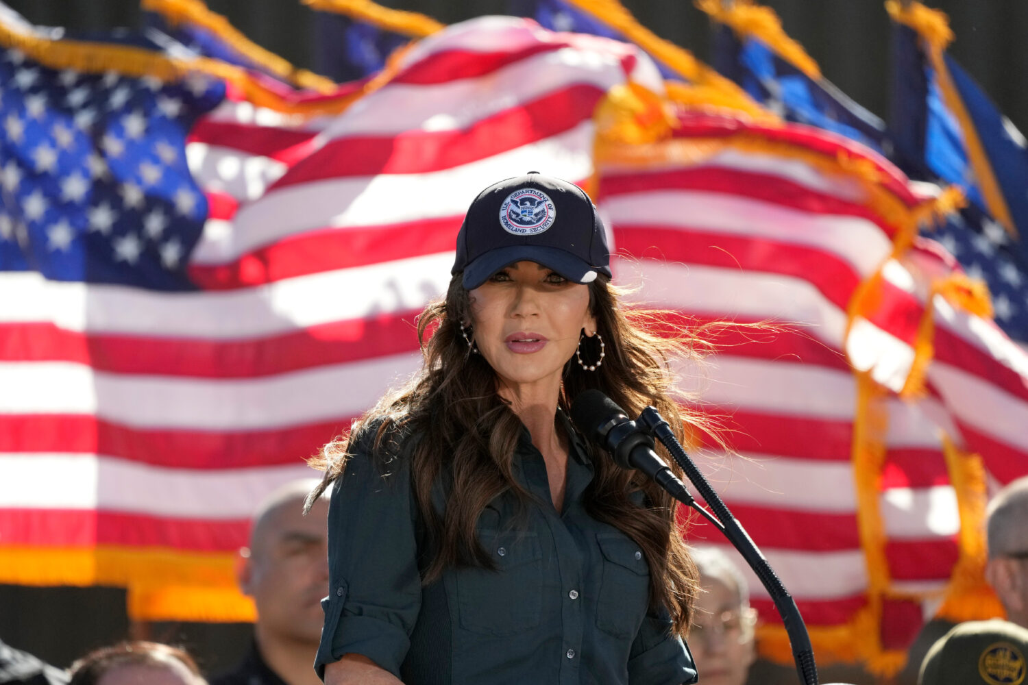 Kristi Noem, Secretary of the Department of Homeland Security, speaks at the border with Mexico, We...