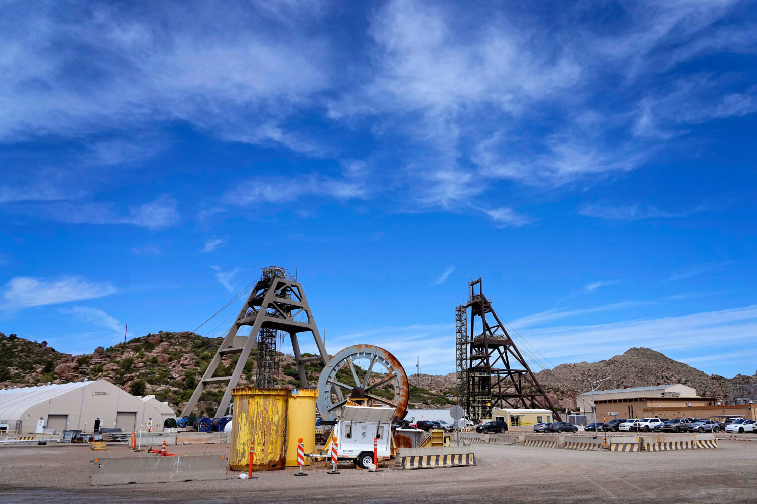 FILE - Mine shafts 10, left, and 9, right, tower over the Resolution Copper Mining Company facility...