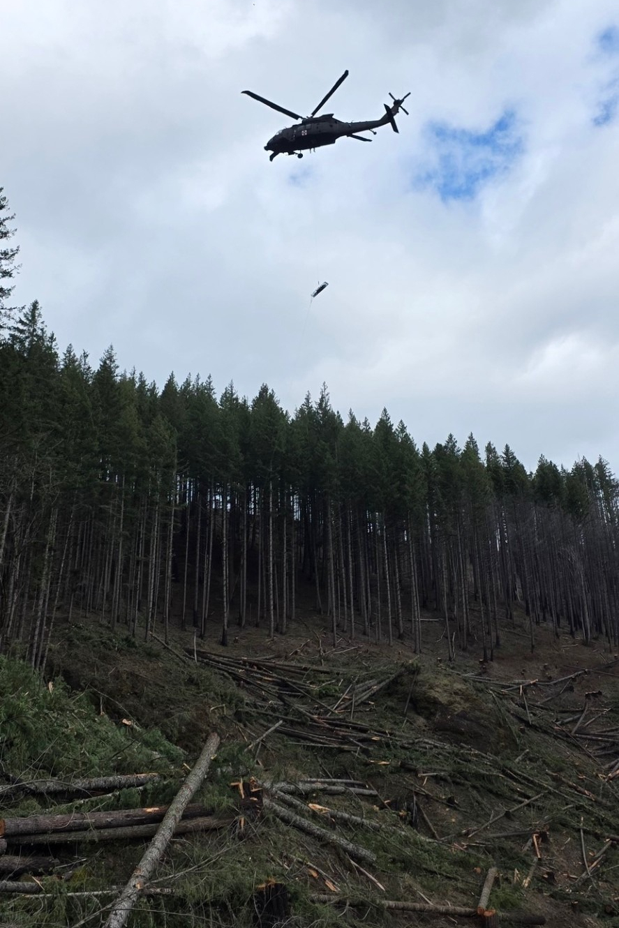In this handout photo provided by the Estacada Fire District, an Oregon Army National Guard helicop...
